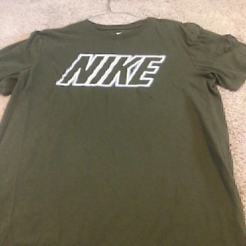 Nike Women’s size medium olive green Nike T-shirt